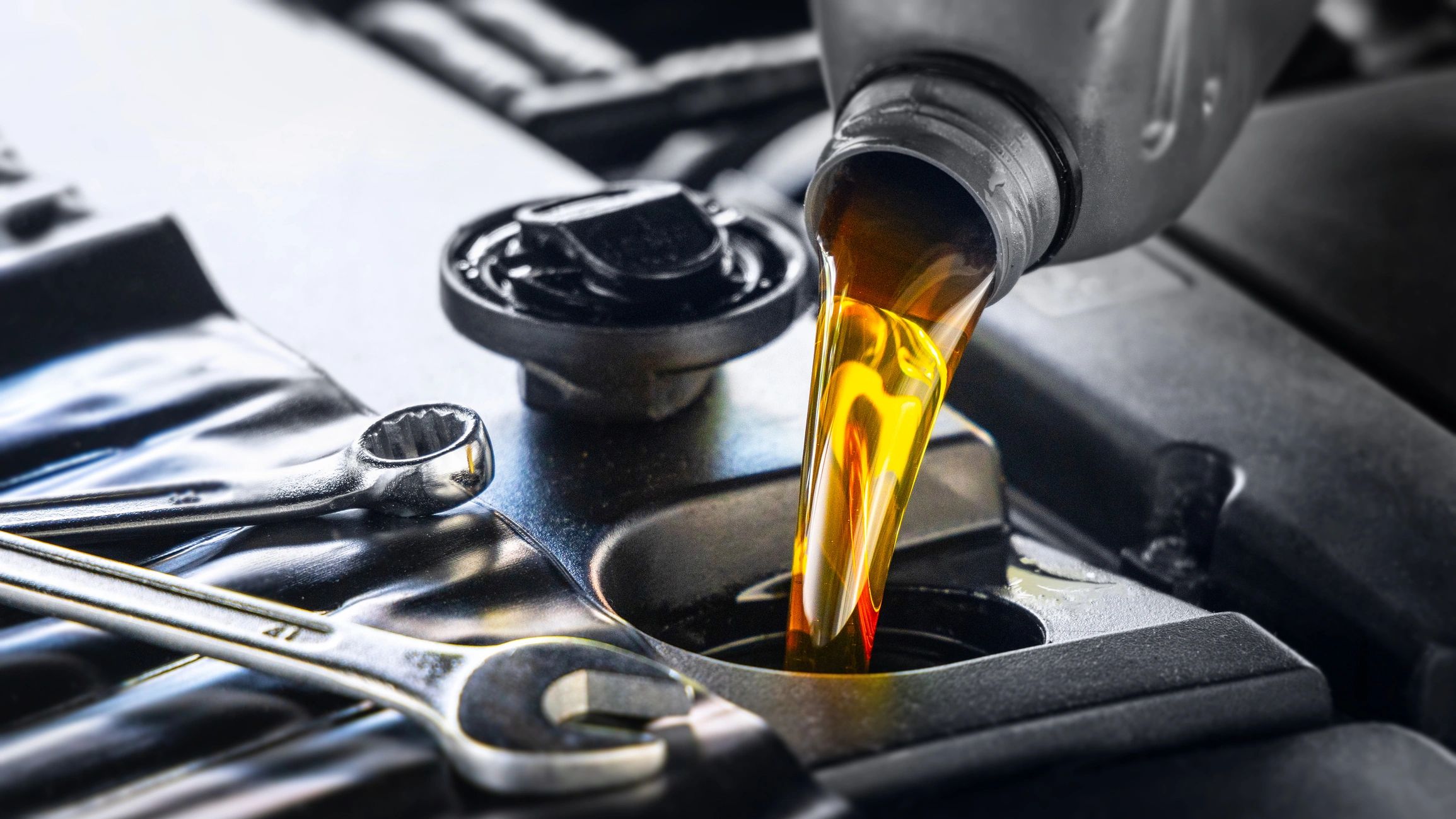 Motor oil being added during vehicle service